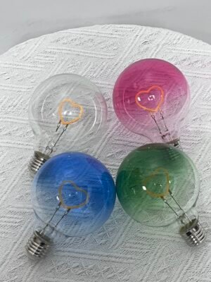 This elegant G95 spherical LED filament bulb creates a vintage decorative aesthetic and a warm, cozy atmosphere.