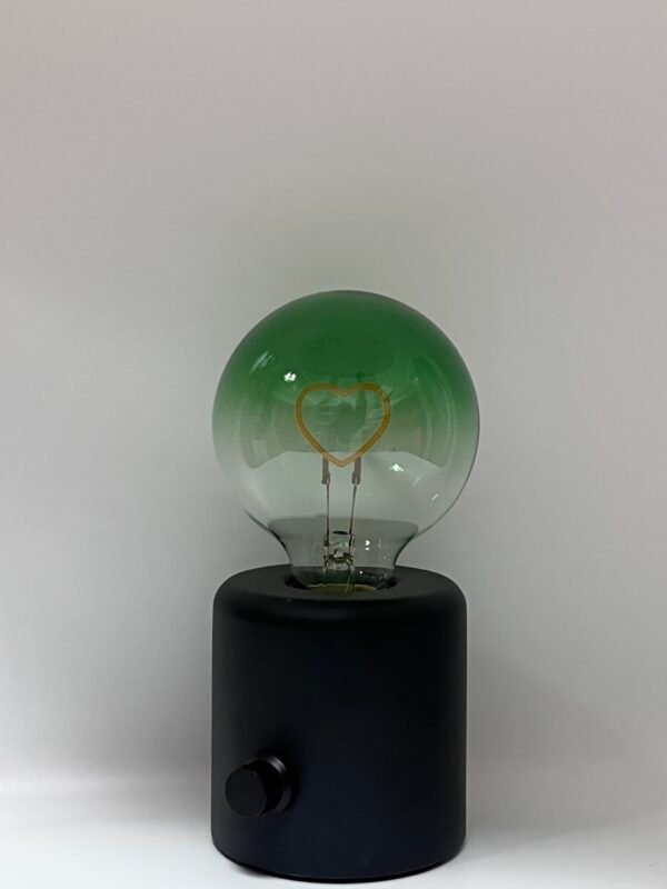 This elegant G95 spherical LED filament bulb creates a vintage decorative aesthetic and a warm, cozy atmosphere.