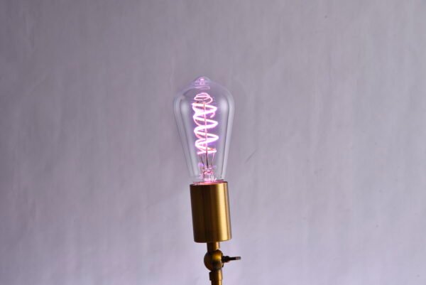 The ST64 Retro LED Bulb features colored lights, including a filament and Edison's creative red, yellow, blue, green, and pink colors.