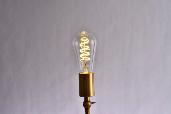 The ST64 Retro LED Bulb features colored lights, including a filament and Edison's creative red, yellow, blue, green, and pink colors.