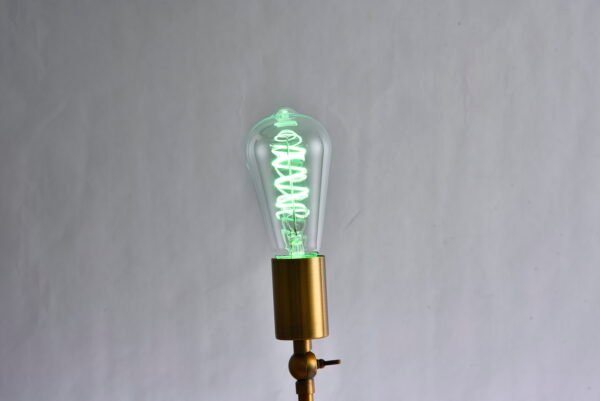 The ST64 Retro LED Bulb features colored lights, including a filament and Edison's creative red, yellow, blue, green, and pink colors.