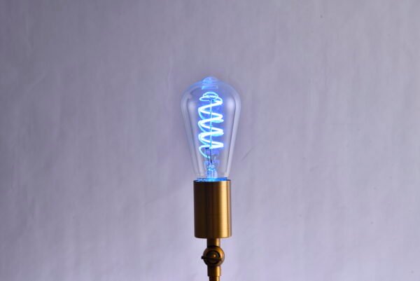 The ST64 Retro LED Bulb features colored lights, including a filament and Edison's creative red, yellow, blue, green, and pink colors.