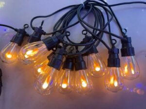 Edison-Style Vintage Flame Filament String Lights (Flame-Effect LED String Lights) — Premium-Quality Outdoor Decor & Festive Lighting. These outdoor string lights feature flickering flame-effect bulbs and are highly popular—especially for courtyard settings and parties.