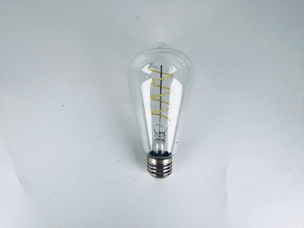 The ST64 Retro LED Bulb features colored lights, including a filament and Edison's creative red, yellow, blue, green, and pink colors.