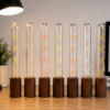 LED filament tube bulbs warm ambient lighting interior display on wooden table hotel restaurant decorative lighting lifestyle scene