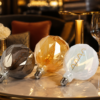 LED filament bulbs vintage warm ambient lighting cafe restaurant table decoration E27 amber glass decorative bulb LED Filament Bulb Cafe Restaurant Ambient Lighting Vintage Warm Scene